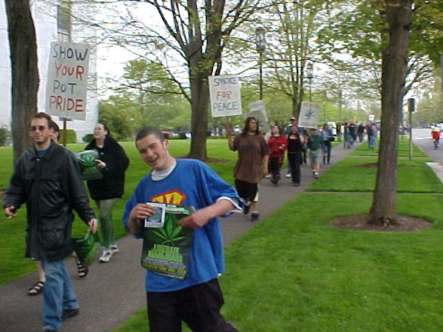 Salem MMM
Marchers parading down Court street on the side-walk.  Drive-bys continue to show support with honks, thumbs-up and various shouts of encouragement